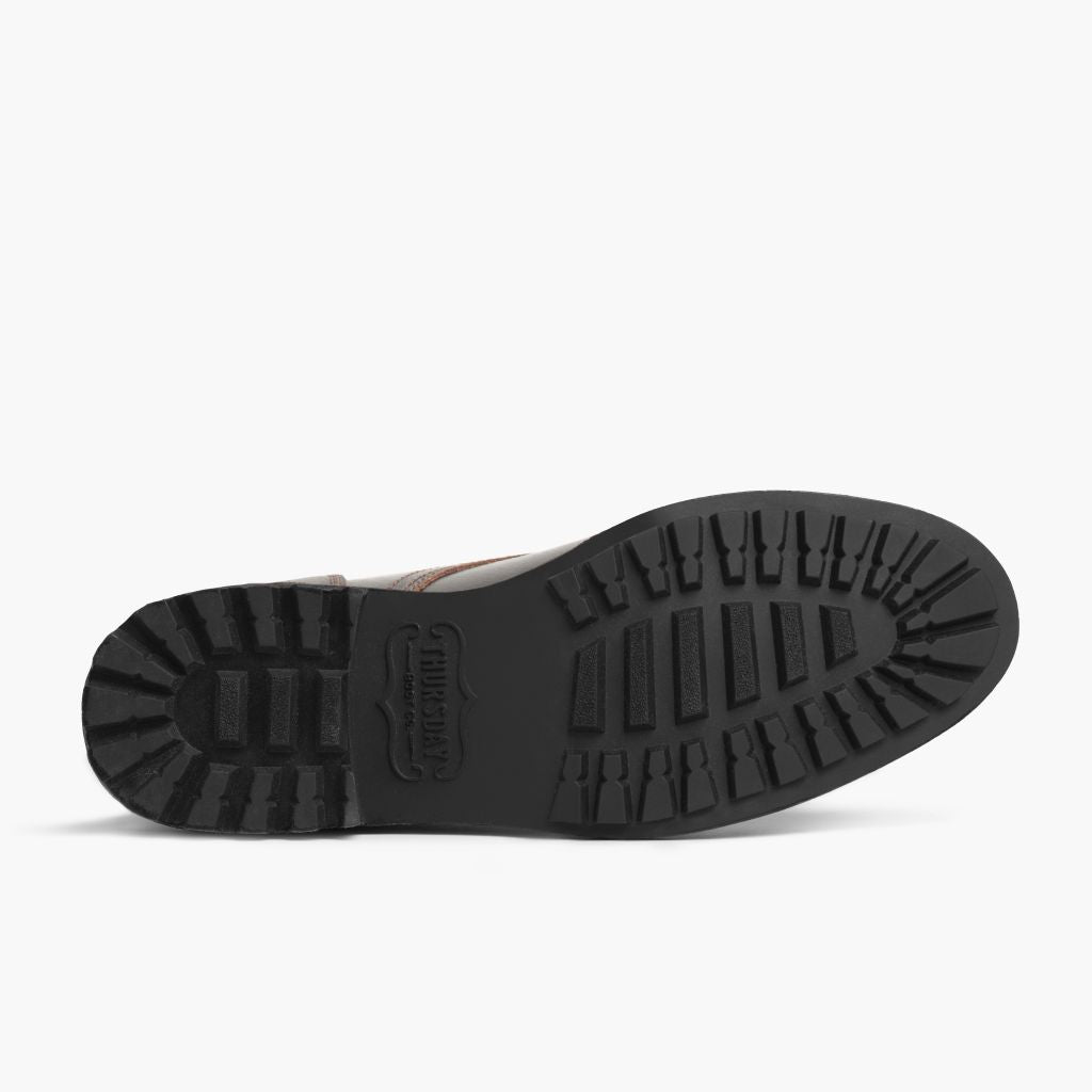 High-Traction Rubber Outsole & Lug Tread Pattern on Logger Waxed Cacao Nahkasaappaat Miehille
