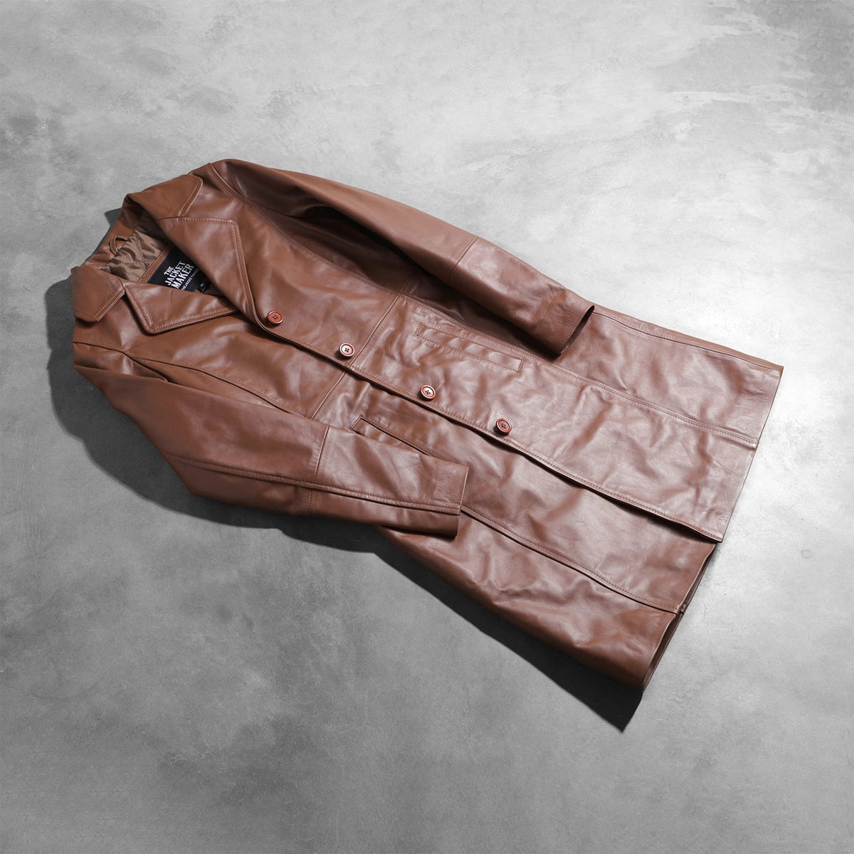 Styled Fit Perspective of Women's Alexis Ruskea Single Breasted Nahkatakki Pitkä Naisille on Model - Natural Daylight Drape