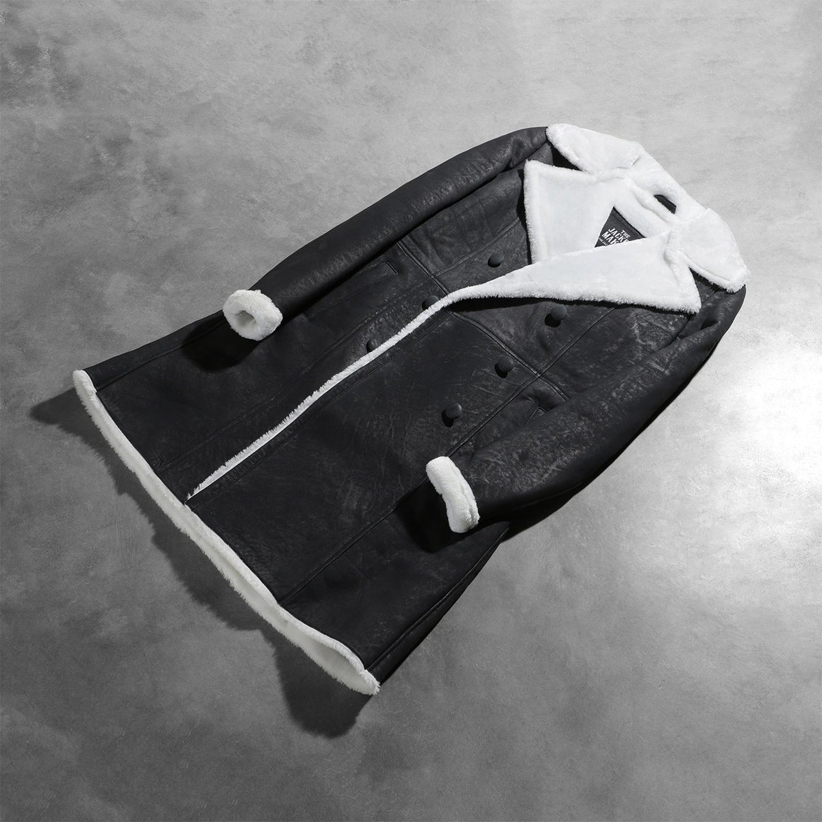 
Open Hem & Hem Craftsmanship Construction Detail on Amie Black Double Breasted Shearling Coat