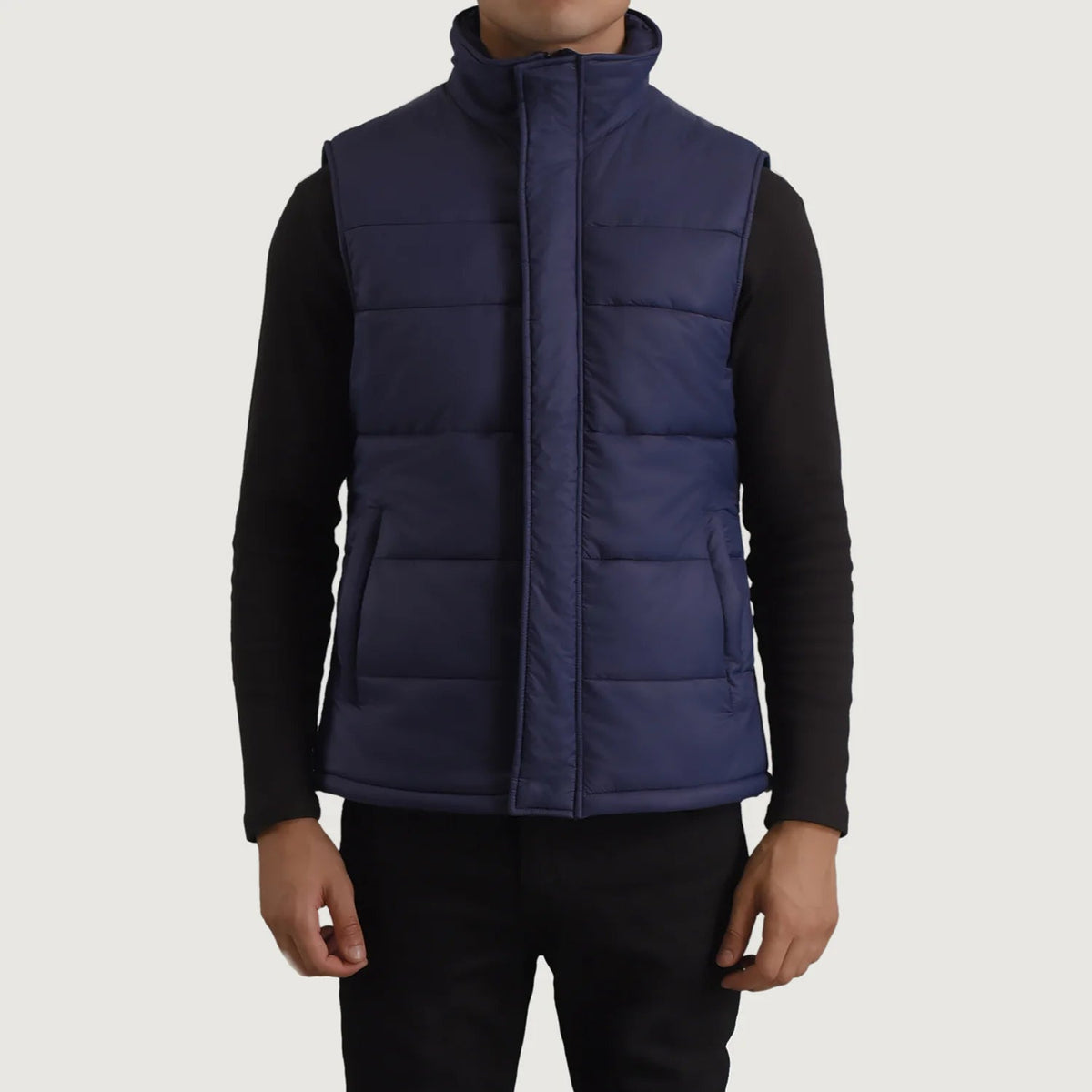 Close-Up Detail of Classic Collar &amp; Zipper With Placket Hardware on Bryan Blue Puffer Vest Miehille