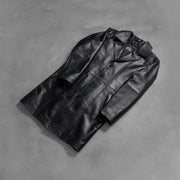 Styled Fit Perspective of Men's Don Long Musta Nahkatakki Pitkä Miehille on Model - Natural Daylight Drape