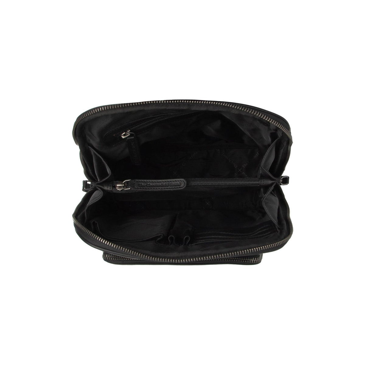 
Solid Antique Brass Hardware & Heavy-Duty Dual Zipper Detail on Floran Pintanahka Backpack