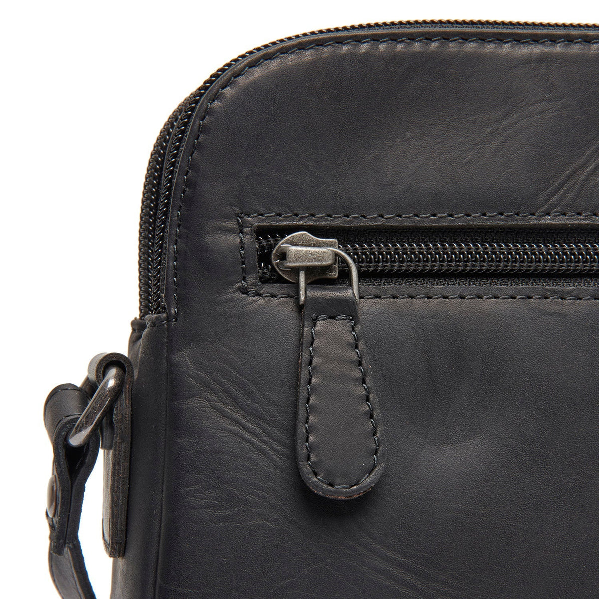 
Vionne Nahkainen crossbody-laukku - Rakenteellinen sivuprofiili ja tilavuus