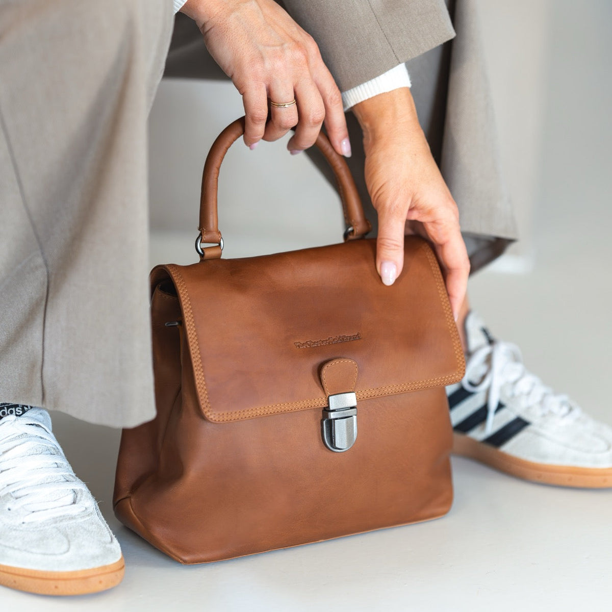 Styled Fit Perspective of Angera Full-Grain Leather Handbag Naisille on Model - Natural Daylight Drape