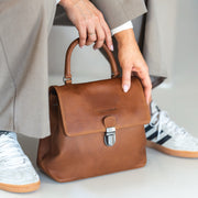 Styled Fit Perspective of Angera Full-Grain Leather Handbag Naisille on Model - Natural Daylight Drape