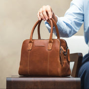 Styled Fit Perspective of Ezra Full-Grain Leather Handbag Naisille on Model - Natural Daylight Drape