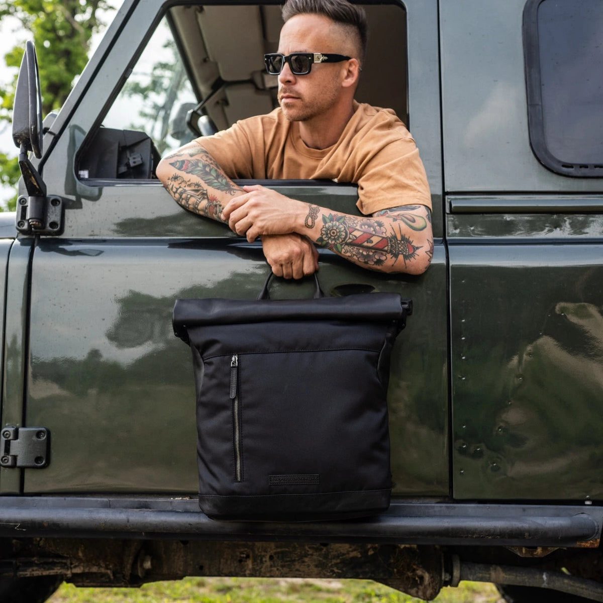 Bornholm Full-Grain Leather Roll-top Backpack Naisille - Structured Side Profile Showing Gusset Depth &amp; Expansion Capacity