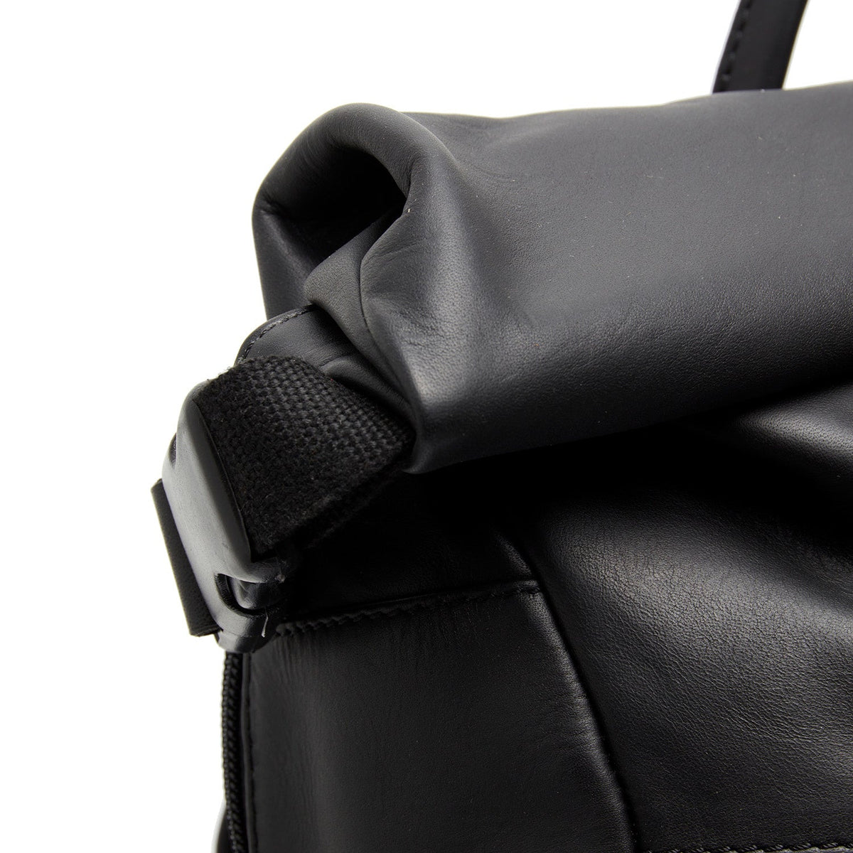Mazara Full-Grain Leather Roll-top Backpack Naisille - Structured Side Profile Showing Gusset Depth &amp; Expansion Capacity