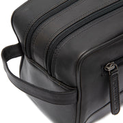 Close-Up Detail of Classic Collar &amp; Heavy-Duty Zipper Hardware on Stacey Full-Grain Leather Toiletry Bag Naisille