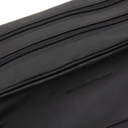 Close-Up Detail of Classic Collar &amp; Heavy-Duty Zipper Hardware on Stefan Full-Grain Leather Toiletry Bag Naisille