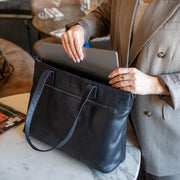 
Solid Antique Brass Hardware & Heavy-Duty Dual Zipper Detail on Osira Nahkainen kangaskassi