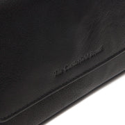 
Solid Antique Brass Hardware & Heavy-Duty Dual Zipper Detail on Rhodos Nahkalompakko