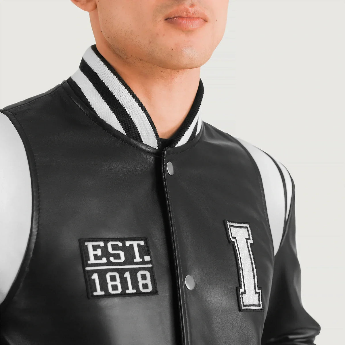 Close-Up Detail of Varsity &amp; Snap Button Hardware on Liberte Illinois Musta Leather Varsity Nahkatakki Miehille