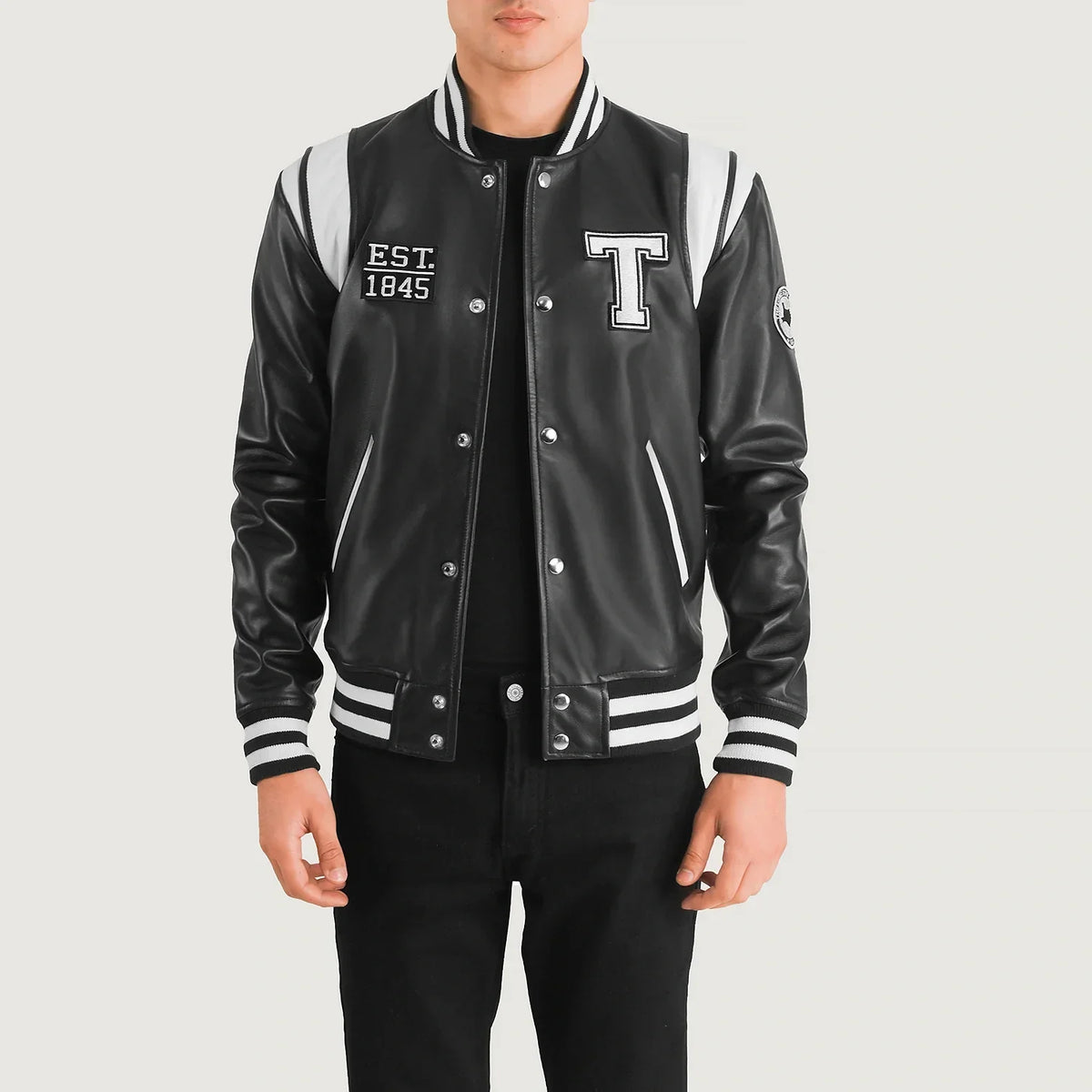 Liberte Texas Musta Leather Varsity Nahkatakki Miehille in Black &amp; White Sheepskin Leather - Front Profile View &amp; Tailored Silhouette | Buy Online