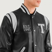 Close-Up Detail of Varsity &amp; Snap Button Hardware on Liberte Texas Musta Leather Varsity Nahkatakki Miehille