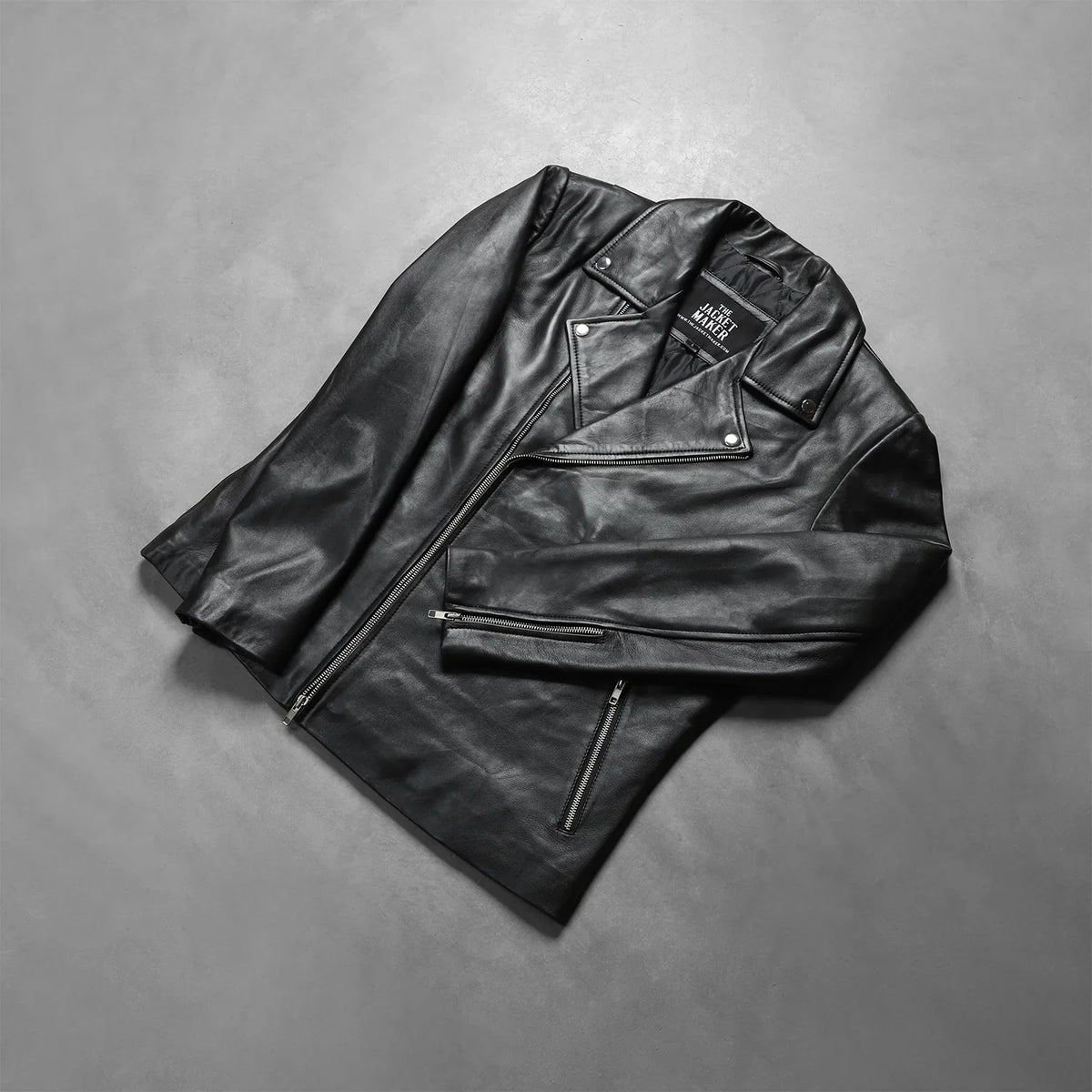 Zipper &amp; Hem Craftsmanship Construction Detail on Men's Noah Black Leather Biker Jacket