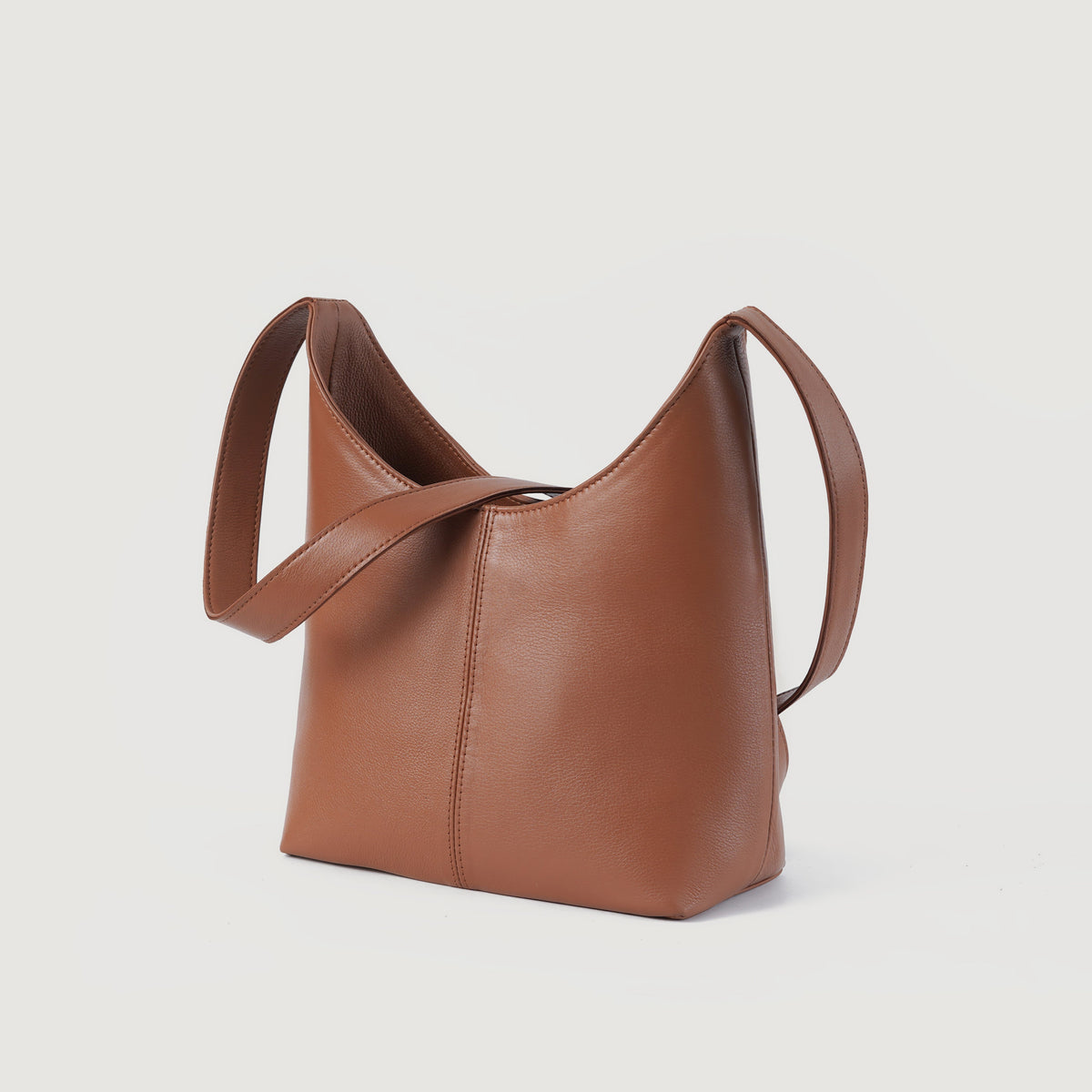 The Stefani Brown Leather Hobo Bag For Women - Lateral Side Profile View Showing Sleeve Cut & Athletic Taper Fit